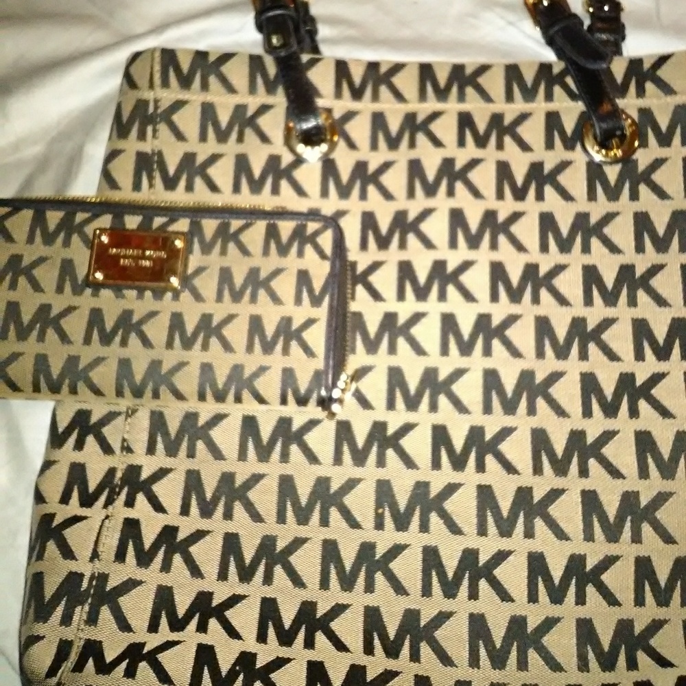 Tan and black jet set Michael Kors purse and walle